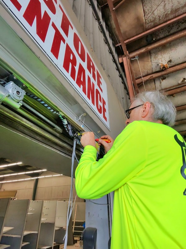 Technician during a door repair in Chamblee